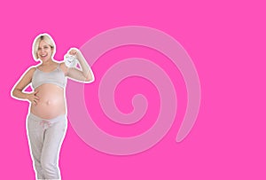 Happy pregnancy. Pregnant belly with alarm clock. Conceptual image. Soon birth. Fetal development by months