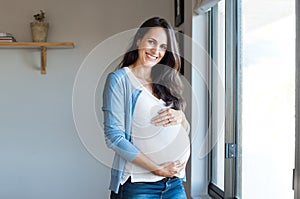 Happy pregnant woman photo