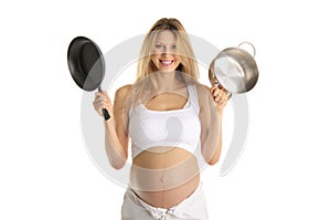 Happy pregnant woman with cooking utensils