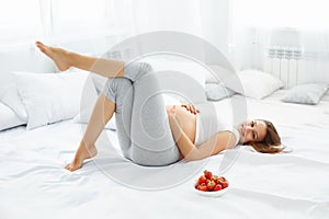 Happy Pregnant Woman Feels Healthy and Gets Some Fun. Healthy Fo