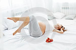 Happy Pregnant Woman Feels Healthy and Gets Some Fun. Healthy Fo