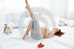 Happy Pregnant Woman Feels Healthy and Gets Some Fun. Healthy Fo