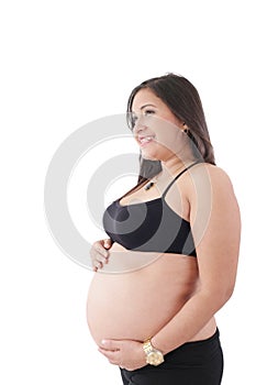 Happy pregnant woman looking to a copyspace