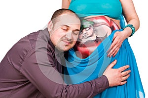 Happy pregnant woman and man