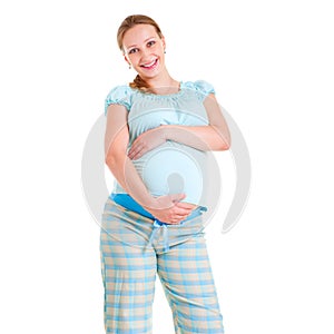 Happy pregnant woman in pyjamas