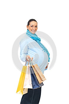 Happy pregnant woman at shopping