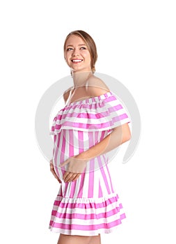 Happy pregnant woman touching her belly