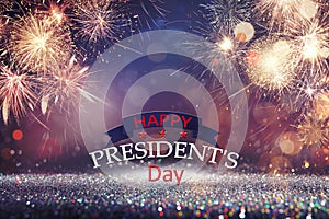 Happy President`s Day - federal holiday. Festive background with fireworks and glitters, bokeh effect