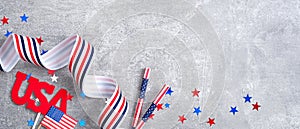 Happy Presidents day sale banner mockup. American flag, sign USA, grosgrain ribbon, confetti stars, drinking straws on stone. USA