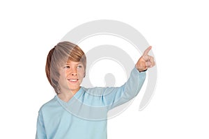 Happy preteen boy pointing something