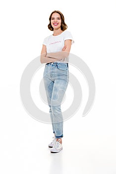 Happy pretty caucasian woman standing isolated with arms crossed