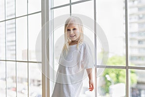 Happy pretty girl wearing blank white dress