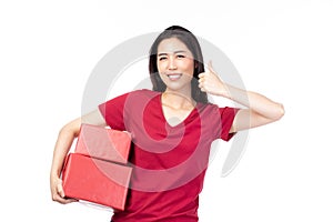 Happy pretty young woman holding gift box present in christmas or new year on white background