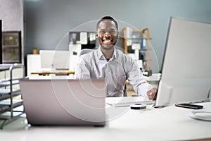 Happy Professional Man Employee Using Computer