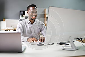 Happy Professional Man Employee Using Computer