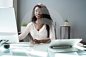 Happy Professional Woman Employee Using Computer