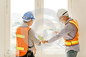 Happy professional worker working together home builder architecture mix race in construction site