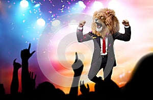 Happy proud man with a lion head in a business suit celebrating victory with crowd cheering