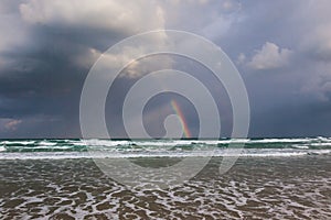 Happy Rainbow on the rainy sea