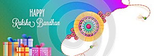 Happy Raksha Bandhan Celebration Concept with Beautiful Rakhi, Gift Boxes on Abstract Gradient Background. Indian i
