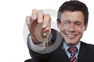 Happy Real estate agent overgives house key