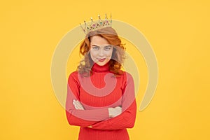 happy redhead woman in crown. self confident queen. expressing smug. arrogant princess