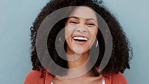 Happy, relax and smile black woman laughing outdoor, cheerful and excited. Portrait of a black female feeling confident