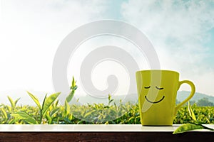 Happy and Relaxation Concept. A Cup of Hot Tea with Smiley Face photo