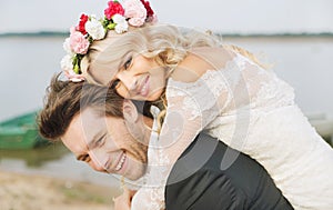 Happy relaxed marriage couple hugging photo