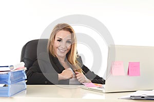 Happy relaxed 40s businesswoman smiling confident working at laptop computer