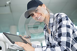 happy repairer fixing printer