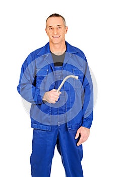 Happy repairman holding wrench