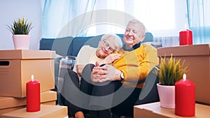 Happy retired couple enjoying valentines day with candle lights. Love romance and dating at old age