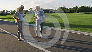 Happy retired couple having fun outdoors