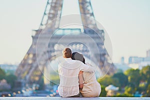 Happy romantic couple in Paris, near the Eiffel tower