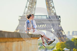 Happy romantic couple in Paris, near the Eiffel tower