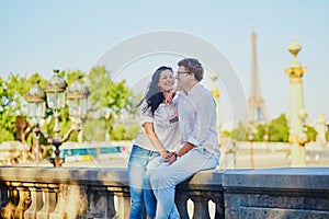 Happy romantic couple in Paris, in Tuileries garden