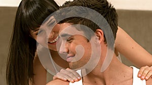 Happy romantic couple relaxing with massage