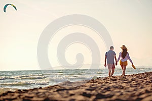 Happy Romantic Middle Aged Couple Enjoying Beautiful Sunset Walk on the Beach