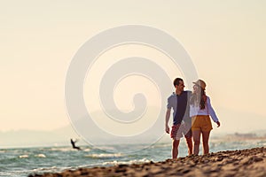 Happy Romantic Middle Aged Couple Enjoying Beautiful Sunset Walk on the Beach