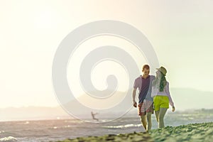 Happy Romantic Middle Aged Couple Enjoying Beautiful Sunset Walk on the Beach