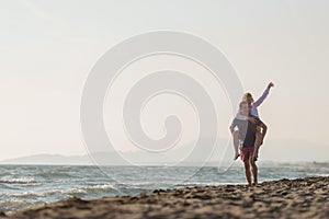 Happy Romantic Middle Aged Couple Enjoying Beautiful Sunset Walk on the Beach