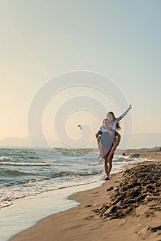 Happy Romantic Middle Aged Couple Enjoying Beautiful Sunset Walk on the Beach