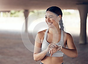 Happy runner woman, smart watch and city fitness, exercise and check training time, progress or goals on digital