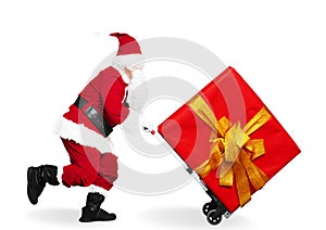 running Santa Claus with shopping cart trolley