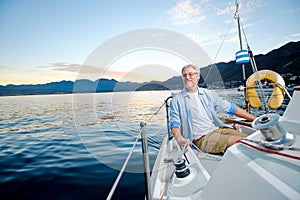 Happy sailing man boat photo