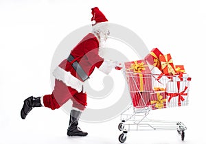 Happy Santa Claus with Christmas shopping cart