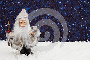 Happy Santa Claus with hat and snow with night sky