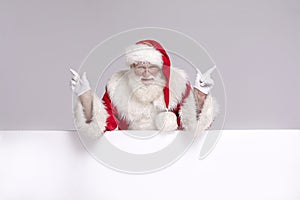 Happy Santa Claus with white empty board
