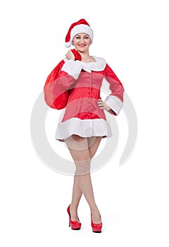 Happy Santa woman holding full big red bag of gifts, isolated on white background. File contains a path to isolation.